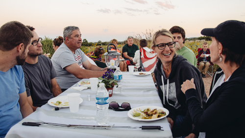 laughing people at tables